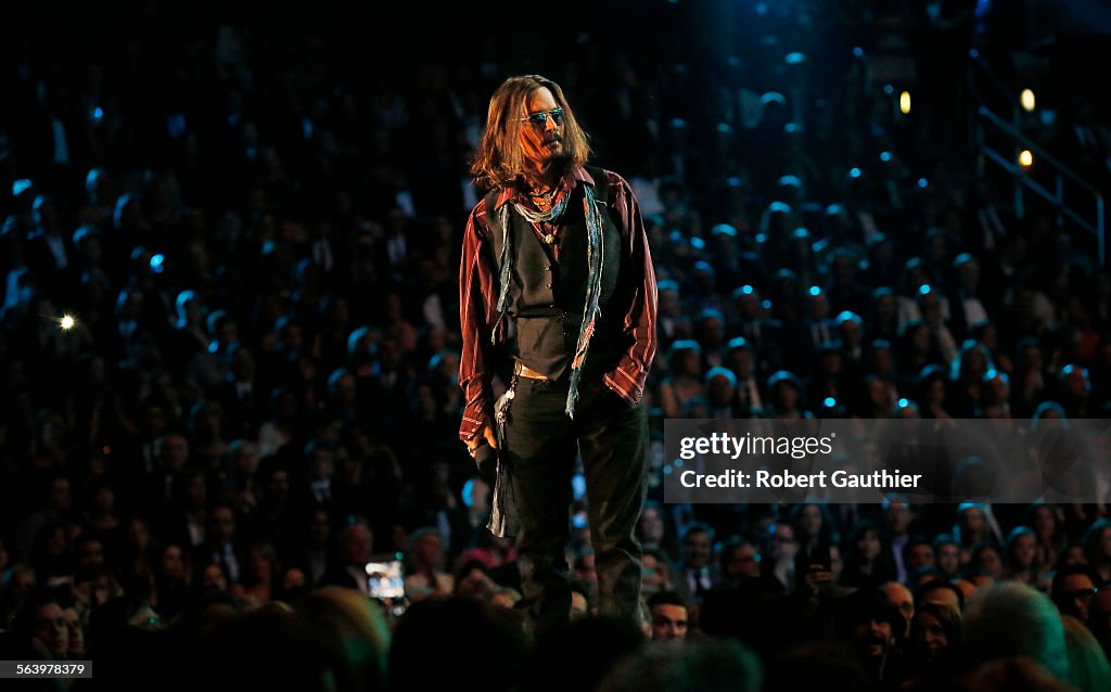 LOS ANGELES, CA - February 10, 2013 Johnny Depp introduces Mumford and Sons at the 55th Annual GRAMM