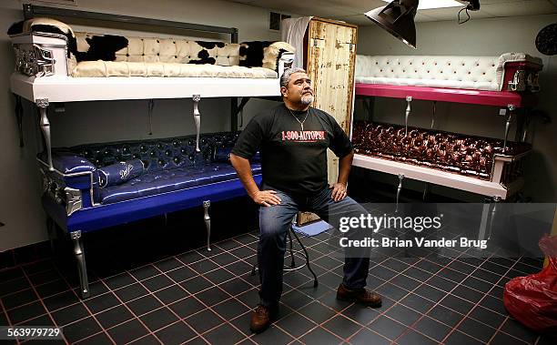 Vidal Herrera with several if his coffin couches he sells at coffincouches.com. Death has been a godsend to Vidal Herrera who founded three...