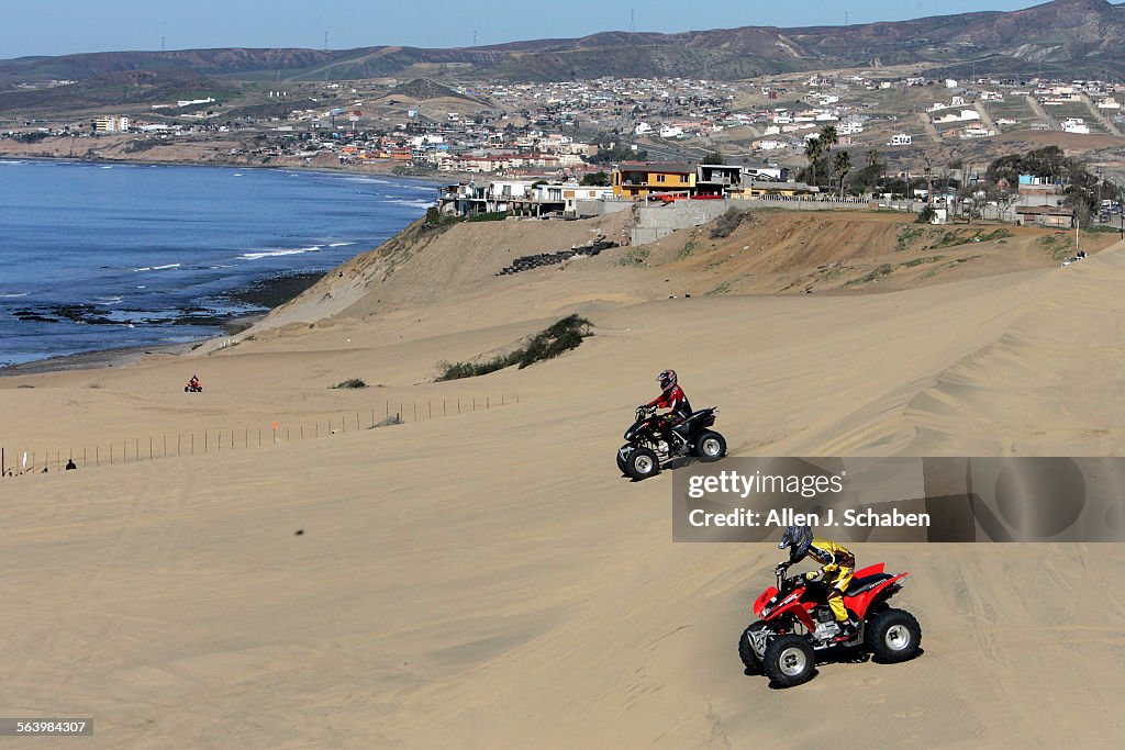Mario Feldman, of Belavvelt, NY, 14, left, and Vittorio, 12, who were riding with their father, Ada