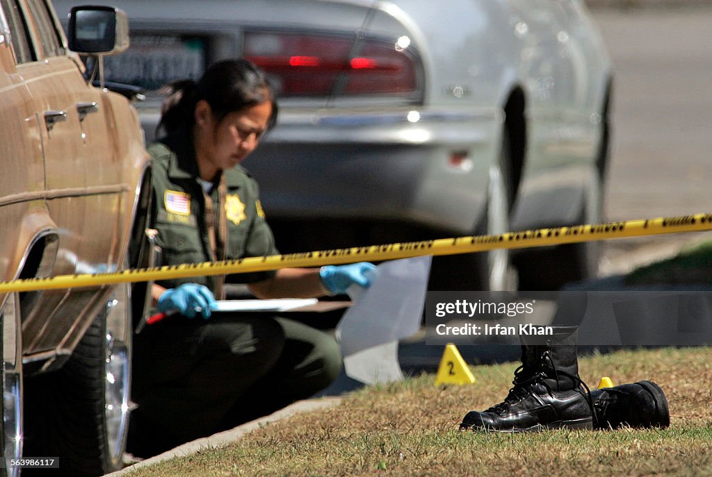 Rialto, Oct. 18, 2007    Shoes belonging to the fatally shot Rialto police officer are lying on