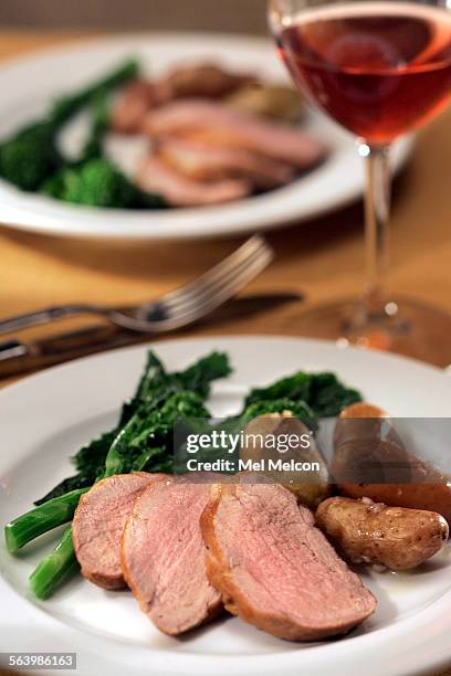 Salt roastingPork tenderloin roasted in rosemary salt with with fingerling potatoes.