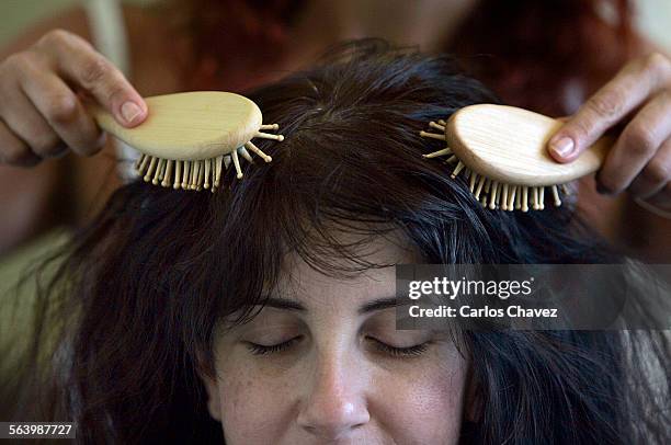 May 01, 2008.Debbie Leavitt received a scalp massage with a pair of hair brushes during a "Steam Scalp Treatment" at Steam Salon in West Hollywood...