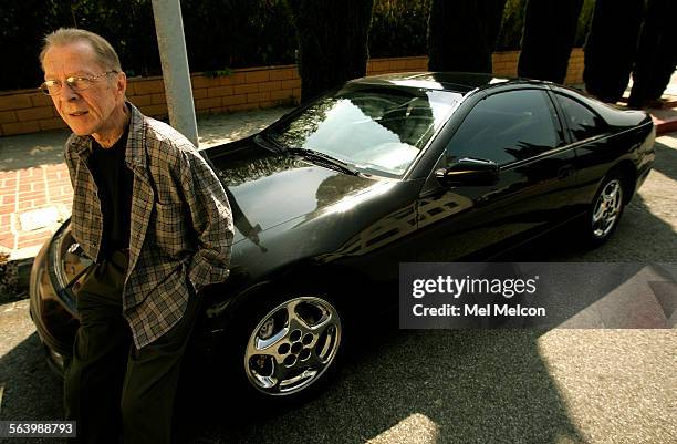 Roman Salicki sits by his 1991 Nissan 300 ZX automobile parked in front of his home on Stanley Ave. In Los Angeles on April 2, 2008. Salicki had his...