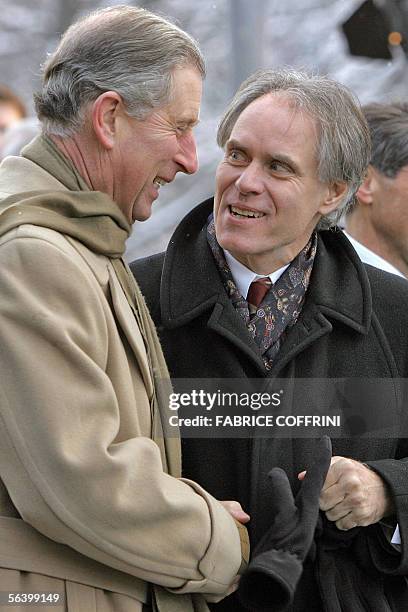 Britain's Prince Charles shakes hands with Swiss Federal Councillor Moritz Leuenberger 09 December 2005 during an official visit in Switzerland to...