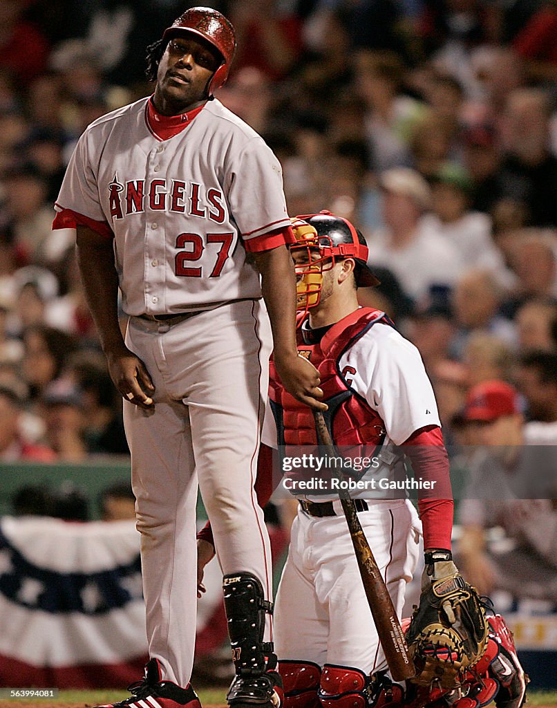 LA Angels designated hitter Vladimir Guerrero shows his frustration after swinging and missing at a