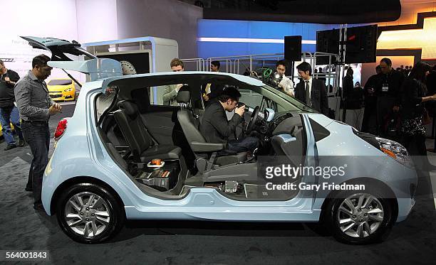 Looking at the interior of the Chevrolet Spark EV which premiered on press day at the LA Auto Show at the Los Angeles Convention Center in Los...