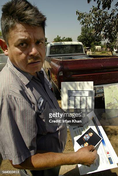 Agony and distress all over his face Jose Gonzalez holding photo of his missing son David Gonzalez meets the media at his residence in Perris on...