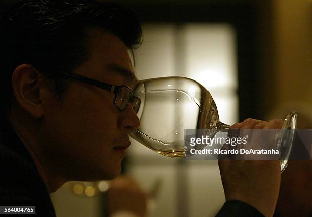 Wine collector Rudy Kurniawan, of Arcadia, wine tasting. Photo to illustrate a column about Pierre Henry Gagey, CEO of Maison Louis Jadot in France,...