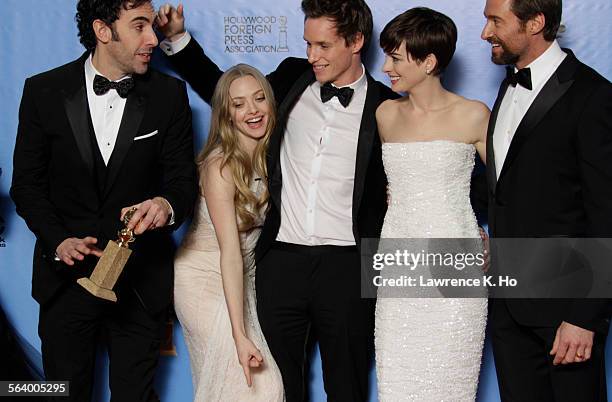 January 13, 2013 Sacha Baron Cohen, Amanda Seyfried, Eddie Redmayne, Anne Hathaway and Hugh Jackman backstage at the 70th Annual Golden Globe Awards...