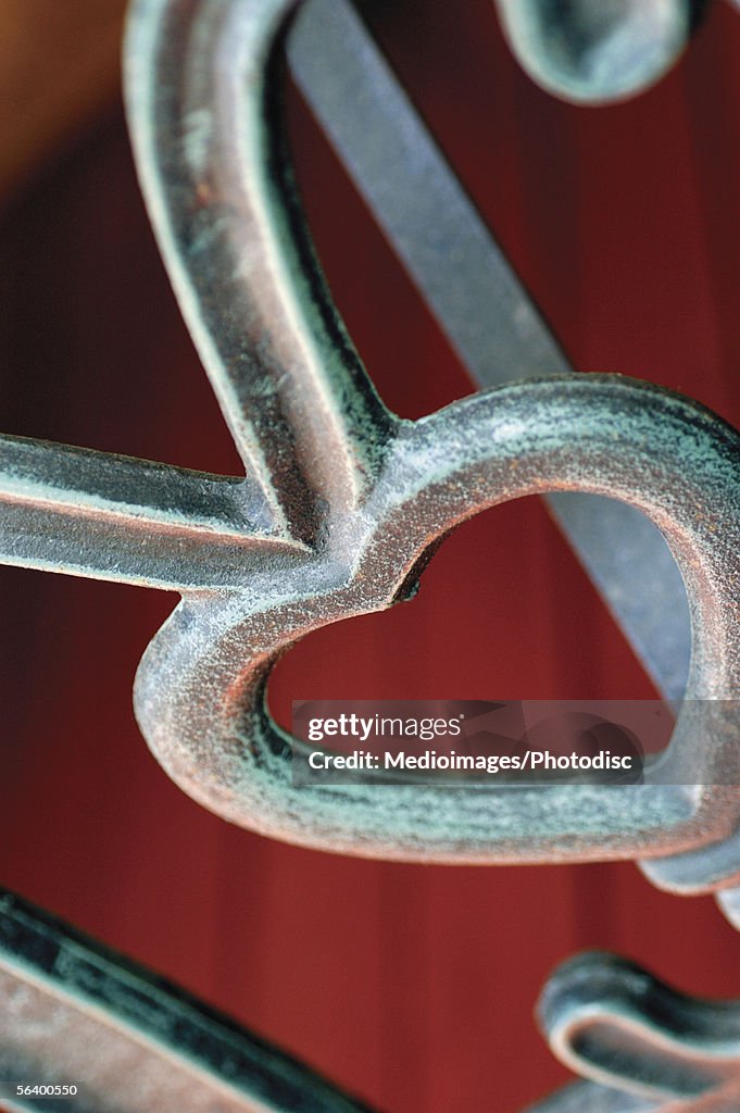 Extreme close-up of wrought iron gate decoration