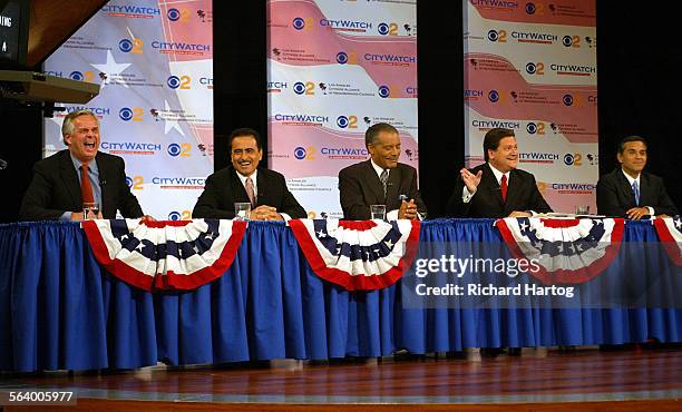 The five candidates share a laugh during a light moment of the LA Mayor's debate at CBS Television City, Monday evening in L.A. From left; Mayor Jim...