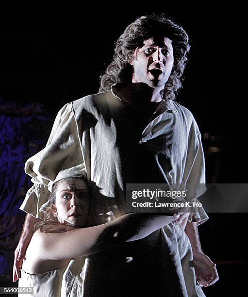 Austin Thompson, right and Diana Newman in the dress rehearsal of The Tempest, an opera by Lee Hoiby based upon Shakespeare's "The Tempest" at the...