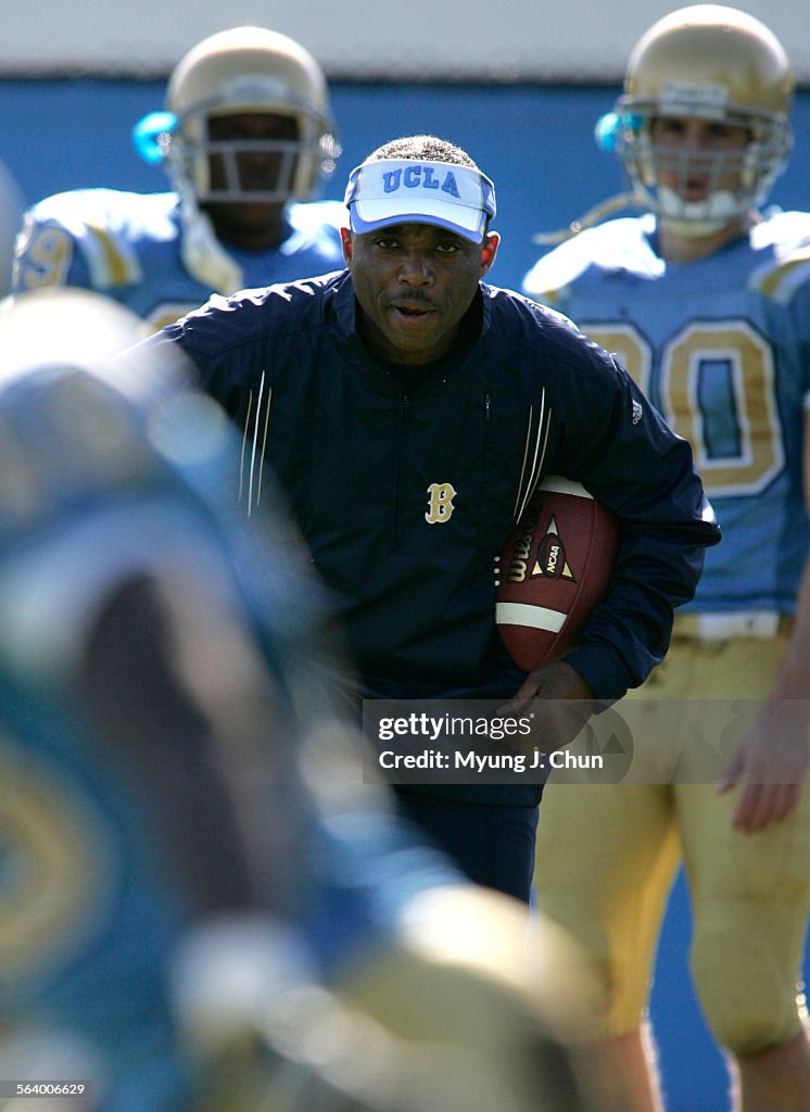 UCLA defensive coordinator DeWayne Walker watches drills during a scrimmage on Saturday, Mar. 4, 20