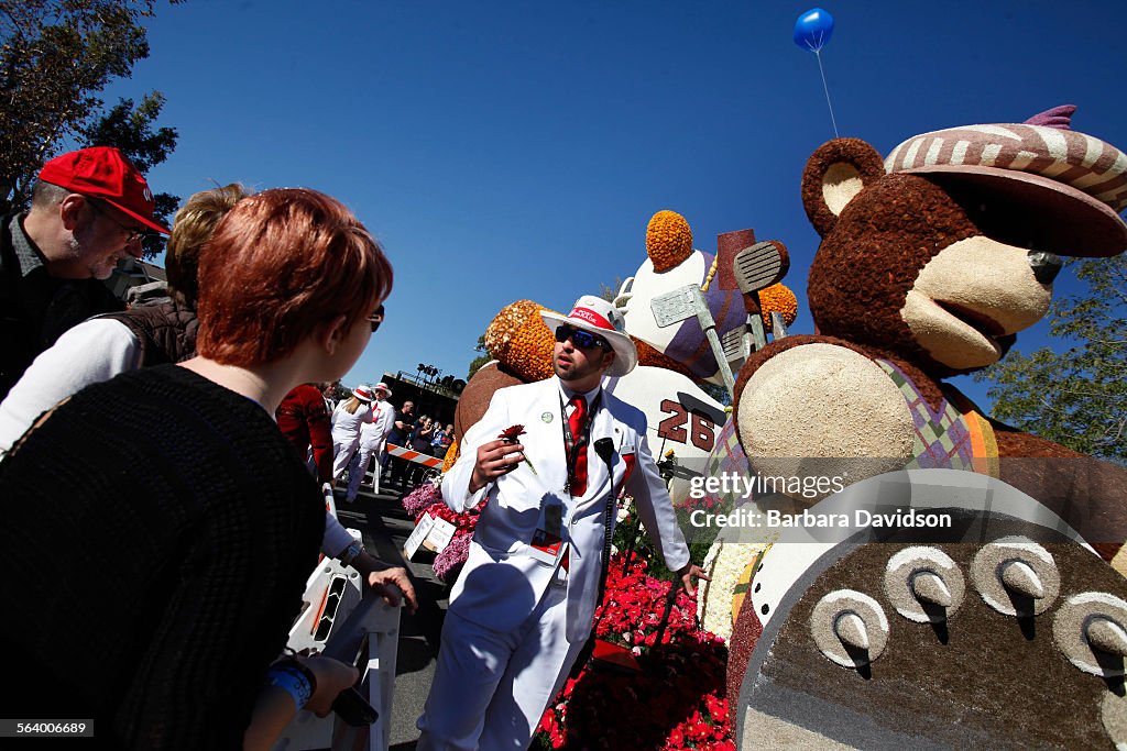 PASADENA.ME.0102-Will Kelso II, a Float official,informs curious spectators about what exactly the S