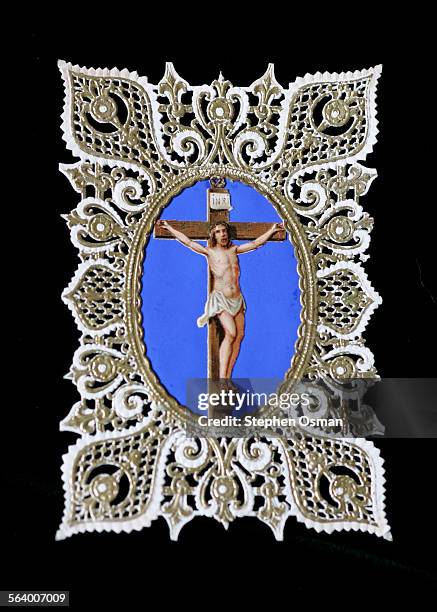 Holy card of Jesus on the cross. Julie Ann Brown has a collection of 40,000 religious cards, depicting various saints, Jesus and the Virgin Mary. Her...