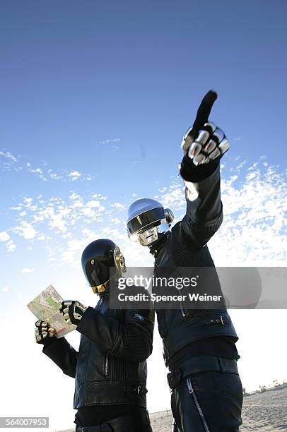 Daft Punk's GuyManuel de Homem Christo and Thomas Bangalter, leftright, at Seal Beach April 13, 2006 for cover photo illustration for Calendar...