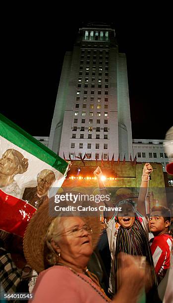 Petra Patino,65 and Priscila Covarrubias are among those celebrating El Grito Thursday in front of City Hall. El Grito, Independence Day for Mexico,...