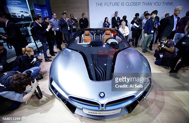 Adrian van Hooydonk, Senior Vice President BMW Group Design introduces the BMW I8 convertible during a press conference at the Los Angeles Auto Show...