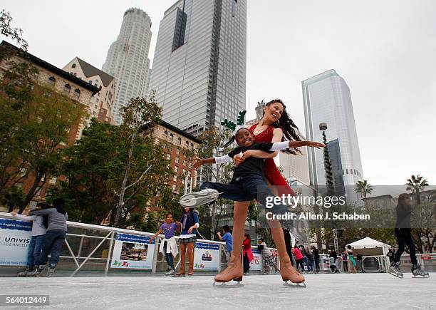 Two-time-Olympian, five-time US National Champion and World Champion Tai Babilonia, right, ice skates and spins around Measia Aaron of the Sheenway...