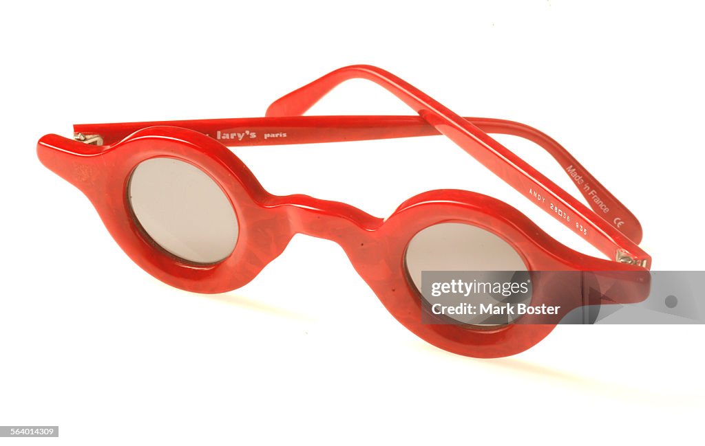 (Los Angeles)Glasses from Fairfax opticalSunglasses with circular red frames by Harry Lary. July