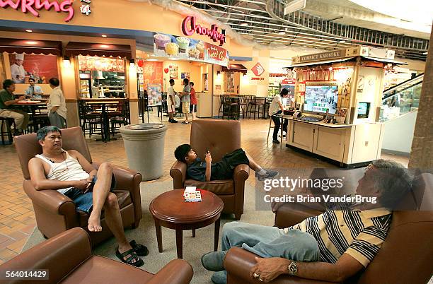 FilipinoAmericans relax in the Eagle Rock Plaza mall on Thursday August 16 2007.
