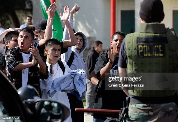 High school students from Huntington Park and South Gate have a confrontation with law enforcement while protesting the immigration bill which is...