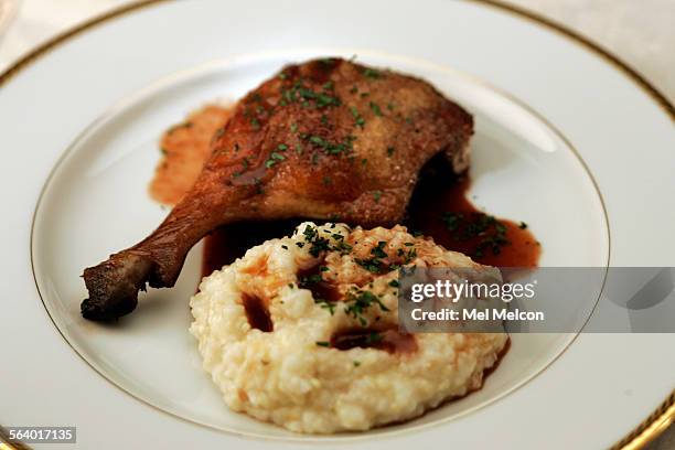 Grits DuckBarbecueBraised Duck Legs with Garlic Grits