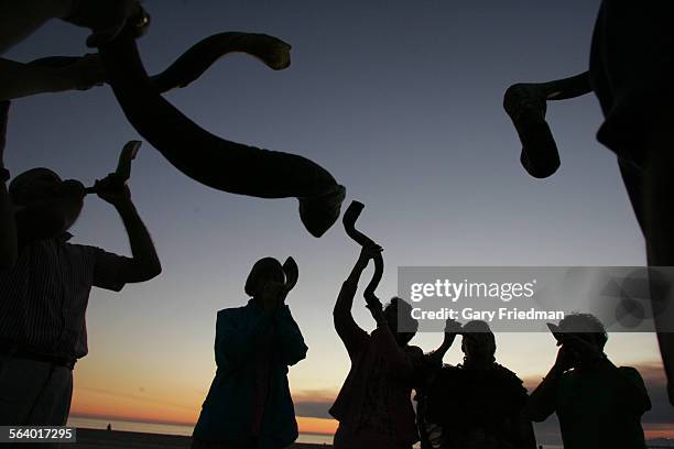 Members of Ahavat Torah gather on the beach in Marina Del Rey outside the home of Rabbi Miriam Hamrell on 9/29/05 where they learn to blow the shofar...