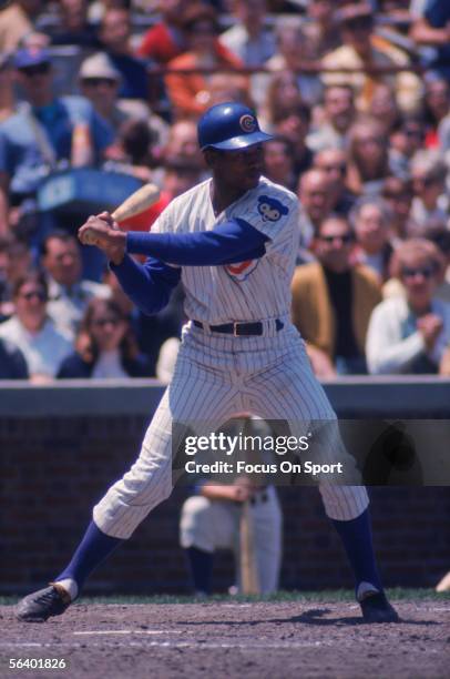 Firstbaseman Ernie Banks of the Chicago Cubs swings during a game at Wrigley Field circa the 1960's in Chicago, Illinois.