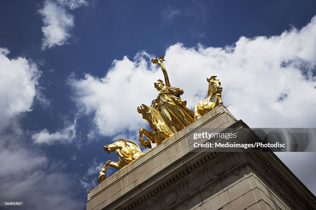 Maine Monument at entrance to the Park at Merchants' Gate in New York City, NY, USA, low angle view