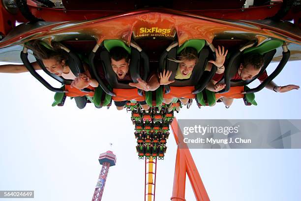 Tina Balena of Santa Clarita; Ryan Van Horn of Murphys; Angel Gladden of Santa Clarita and Roy Gladden of Santa Clarita ride the new roller coaster,...