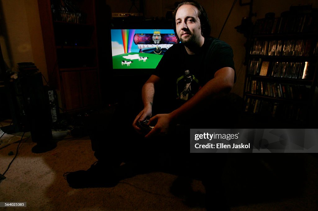 Brooks Brown sits in the basement of his home that he shares with his girlfriend and roommate on Ju