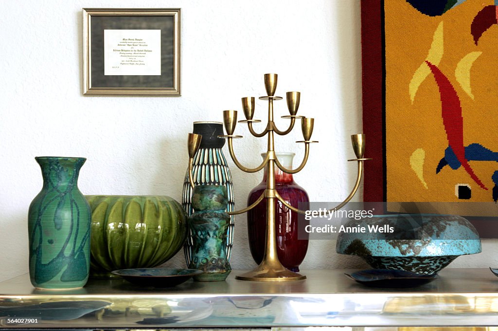 This is a grouping of midcentury collectibles in the living room. For INTERIOR MONOLOGUE. The focu