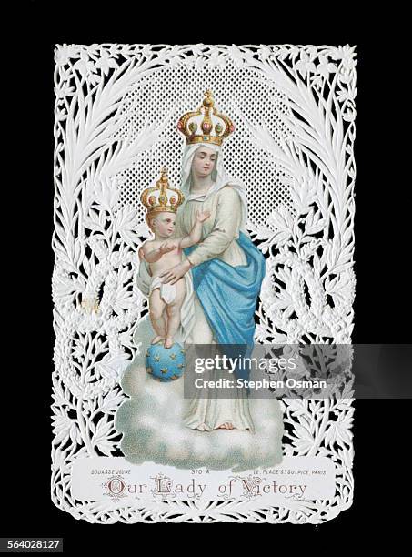 Holy card depicting Mary with baby Jesus. This Our lady of Victory card was reproduced by Brown and sold as a fundraiser for the victims of September...