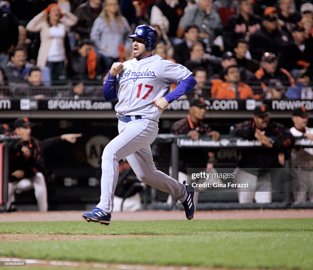Jason Repko Dodgers Jason Repko races to home plate to score the go ahead run in ...