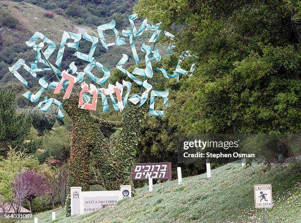 Entrance to Camp Ramah in Ojai which sponsors a weeklong Passover getaway. It joins a trend for Jewish families to celebrate the holiday away from...