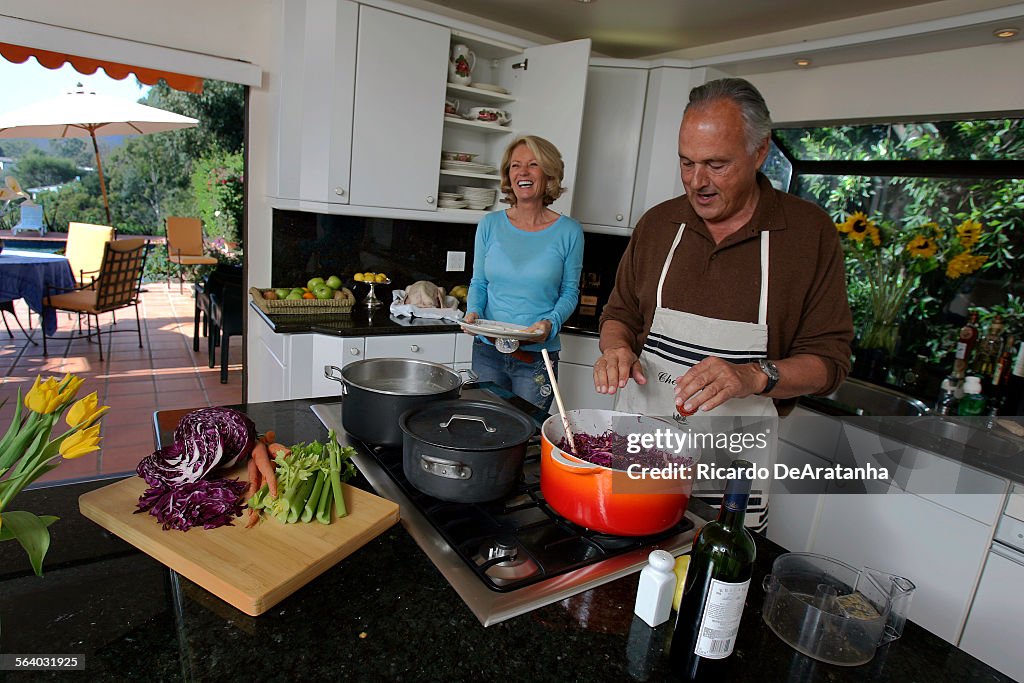 Hans Herderer preparing Blaukraut (red cabbage) to go with roast goose and German potato dumplings.