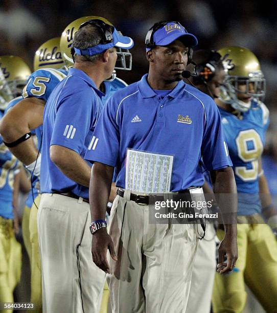 Coach Karl Dorrell paces the sideline agasint Rice at the Rose Bowl in Pasadena, Saturday Sept. 9,2006.