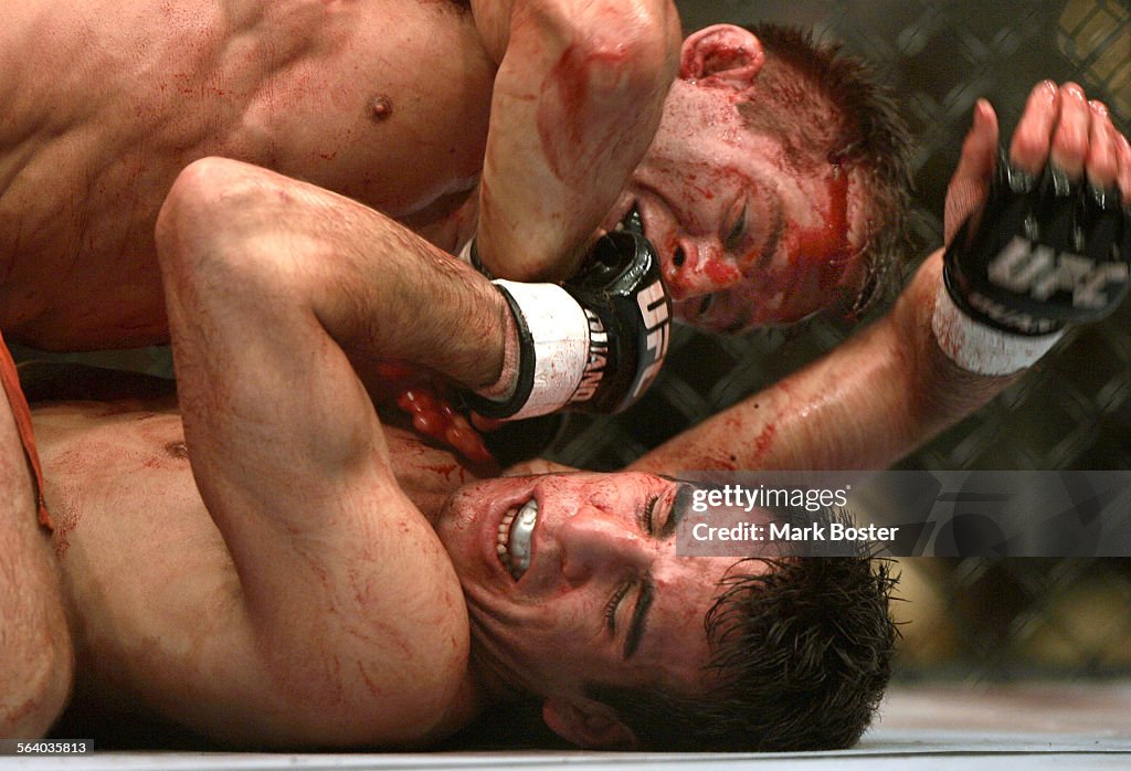 (Las Vegas)Welterweight (170 lbs)fighters Kenny Florian (bottom)and Sean Sherk(top) engage in a bl