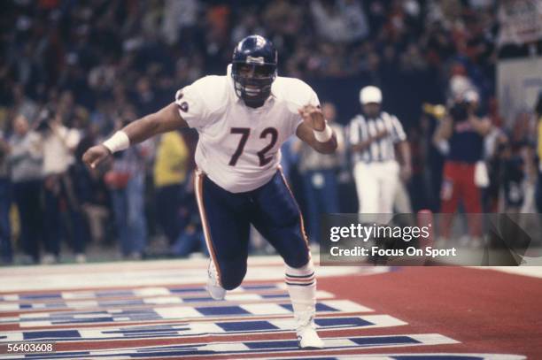 Defensive Lineman William "The Refrigerator" Perry of the Chicago Bears runs in the end zone during Super Bowl XX against the New England Patriots at...