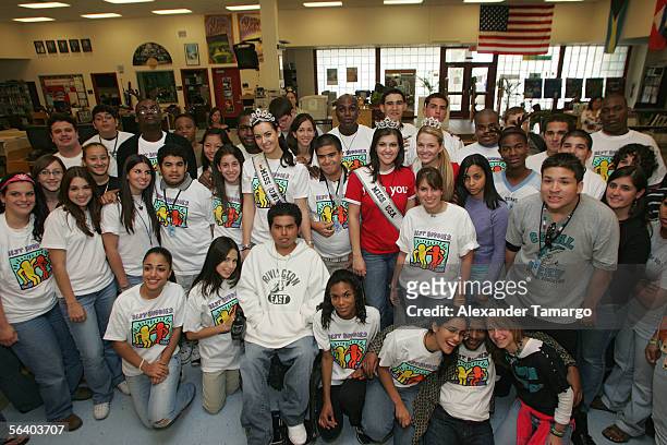 Miss Universe Natalie Glebova, Miss Teen USA Allie LaForce and Miss USA Chelsea Cooley pose with students at Coral Reef Senior High School for the...