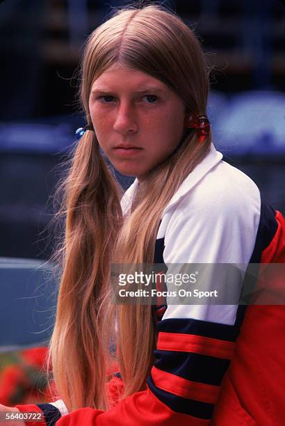Andrea Jaeger sits during a tennis match.