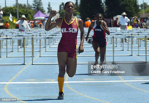 The 2005 CIF Southern Section Track & Field Divisional Finals was held on 5/21/05 at Cerritos College. Ebony Collins of Long Beach Wilson runs in the...