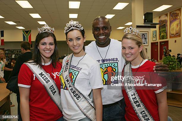 Miss USA Chelsea Cooley, Miss Universe Natalie Glebova, Olympics star Carl Lewis and Miss Teen USA Allie LaForce pose at Coral Reef Senior High...