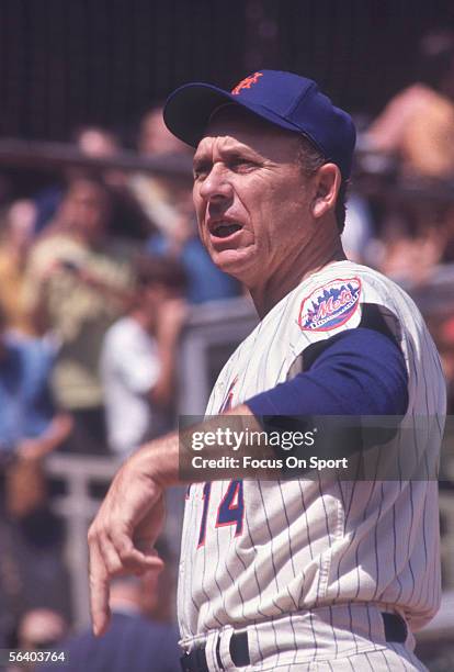 Gil Hodges, coach of the New York Mets, throws a ball to the field circa the 1960's during a game. Gil Hodges was the first coach to lead the Mets to...