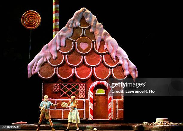 Dress rehearsal of Hansel and Gretel with Maria Kanyova as Gretel, Lucy Schaufer as Hansel with the gingerbread house in the background in Act II.