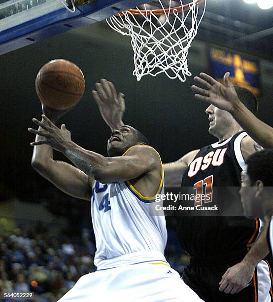 Bruins @@#4 Arron Afflalo shoots as Oregon Nick DeWitz tries to block the shot.Secondhalf game action Bruins win 6961. UCLA vs. Oregon State at...