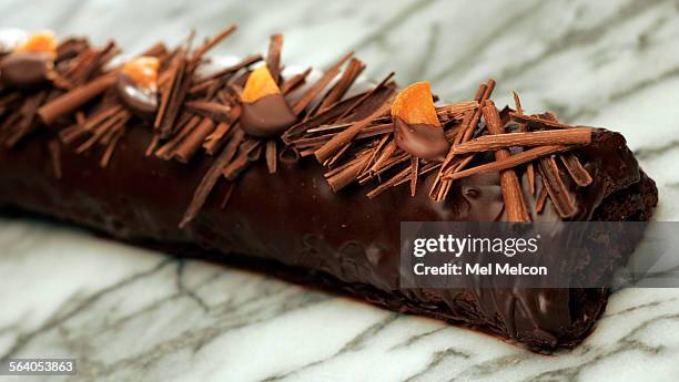 Revillion.BucheBuche de Noel with apricot jam, chocolate spunge cake.