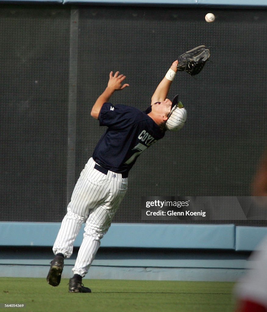 Right fielder Bobby Coyle of Chatsworth makes the catch on a ball hit by David Bierman of Cleveland