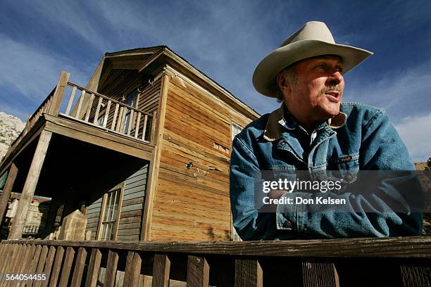   The former riproaring 1870s silver town  Cerro Gordo  is fighting to stay alive. Owner/caretaker Mike Patterson, seen here in front of the...